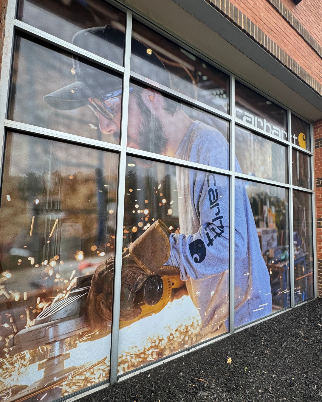 Carhartt storefront window graphics installed by Wrap Kingz